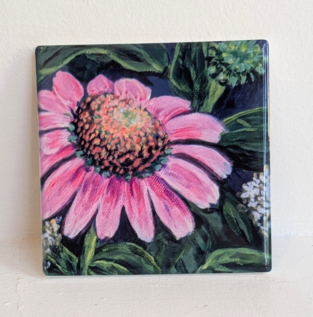 Square ceramic tile with a pink flower design with a dark blue green background