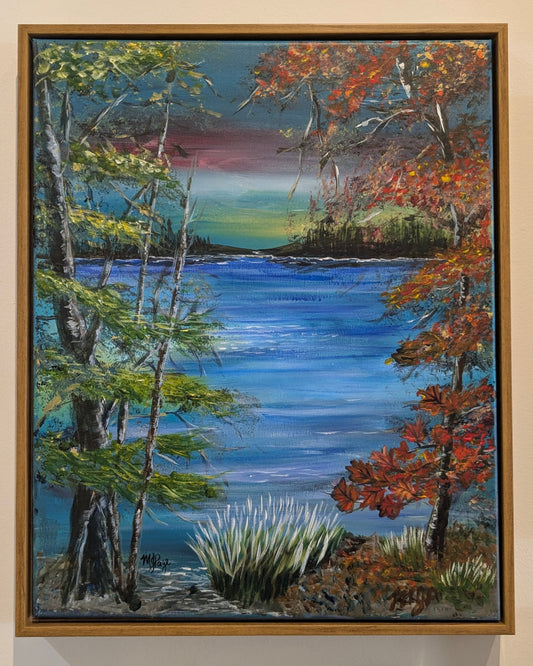 Framed painting of a landscape with trees and a lake.