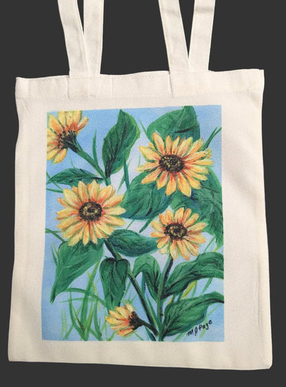 Tote bag with a floral design featuring sunflowers on a white background