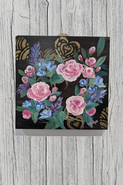 Floral design on a black background with decorative elements and gold hearts on a black background