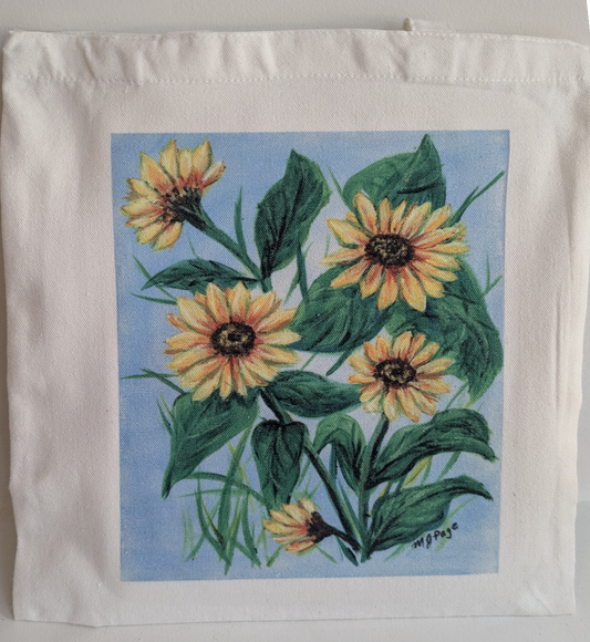 Tote bag with sunflower design on a light blue background