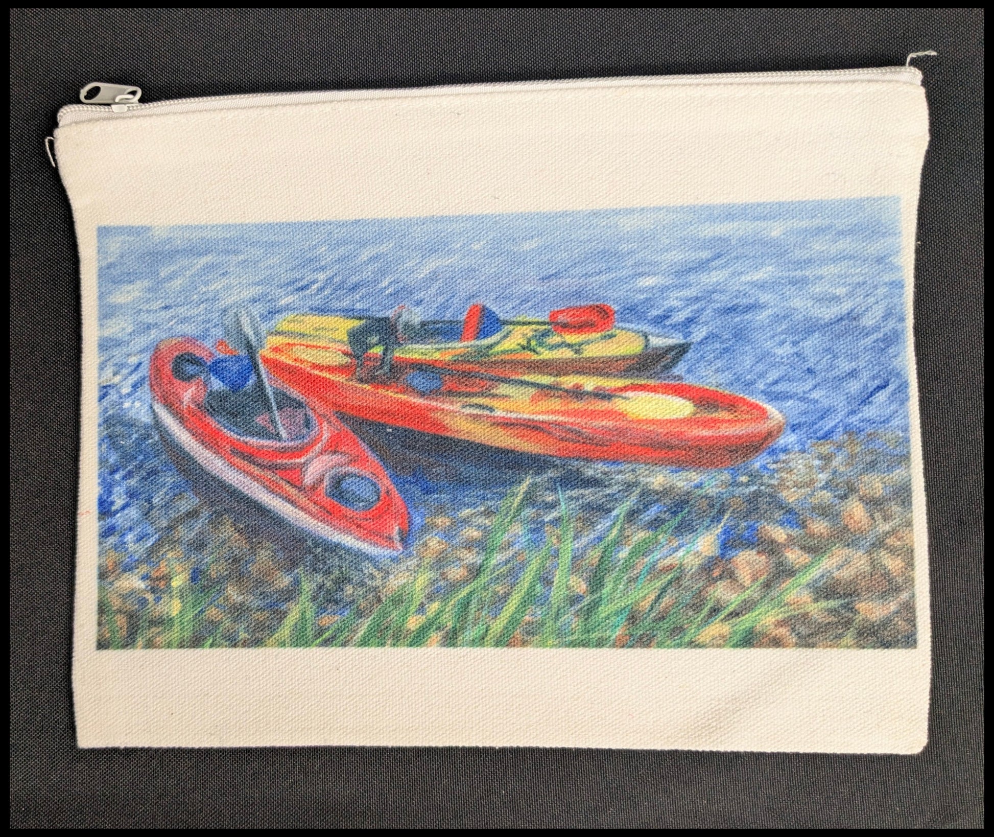 Pouch with a painting of three kayaks on water, on a black background