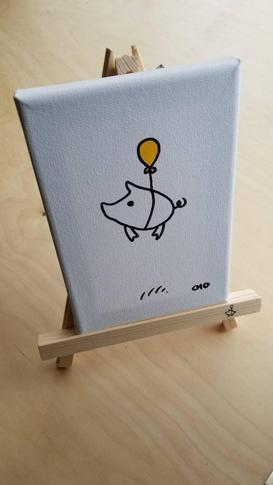flying piggie wood easel